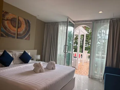 Deluxe Double Room with Side Sea View — Modern Living Residence